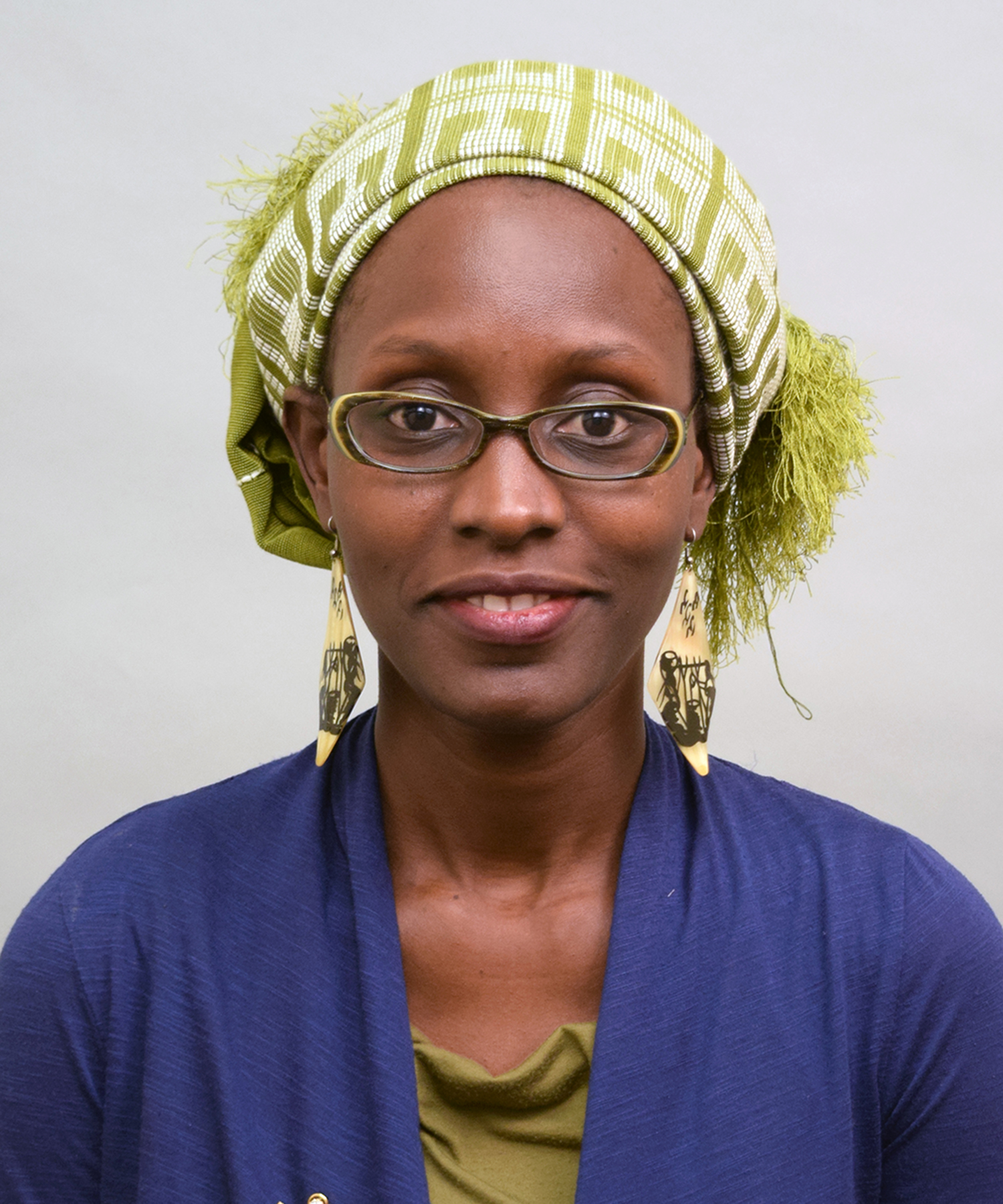 Head and shoulders photo of smiling Omonyele Adjognon